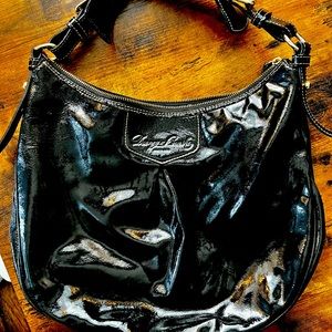 Dooney and Bourke Patent leather satchel bag with gold hardware